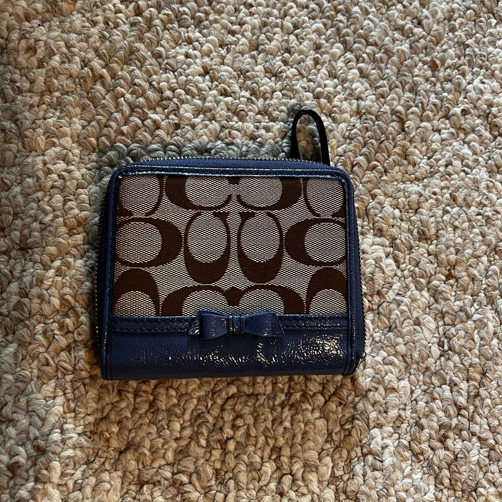 Coach blue and brown wristlet